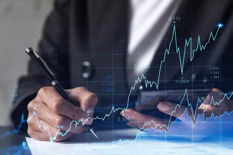Zuspitzung im Fall Benko businesswoman formal wear is signing contract invest money stock market internet trading wealth management checking details transaction smart phone forex scaled Versicherungspapa