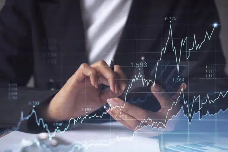 Fondsbranche blickt auf „starkes Jahr“ zurück woman financial trader formal wear is checking phone sign contract invest money stock market internet trading wealth management concept forex hologram chart scaled Versicherungspapa